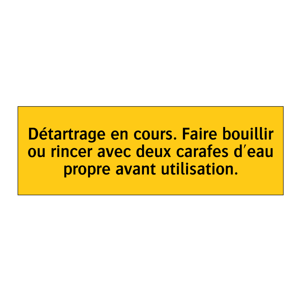 Détartrage en cours. Faire bouillir ou rincer avec deux carafes d'eau propre avant utilisation