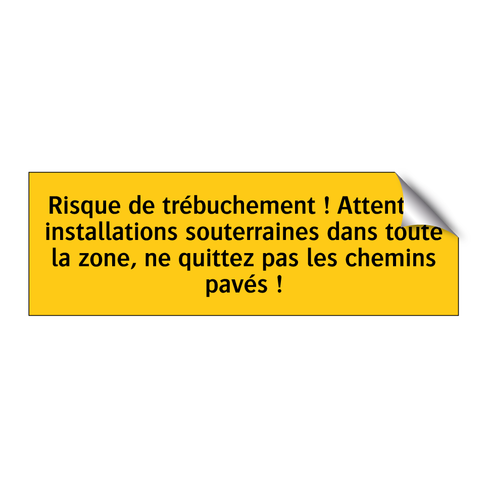 Risque de trébuchement ! Attention installations souterraines dans toute la zone, ne quittez pas les chemins pavés !
